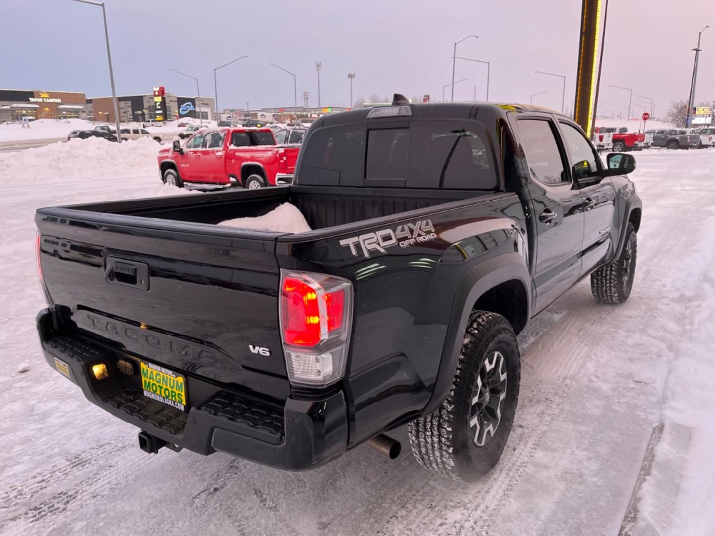 2023 Black Toyota Tacoma TRD Off Road Double Cab V6 6AT 4WD (3TMCZ5AN1PM) with an 3.5L V6 DOHC 24V engine, 6A transmission, located at 1960 Industrial Drive, Wasilla, 99654, (907) 274-2277, 61.573475, -149.400146 - Photo#5